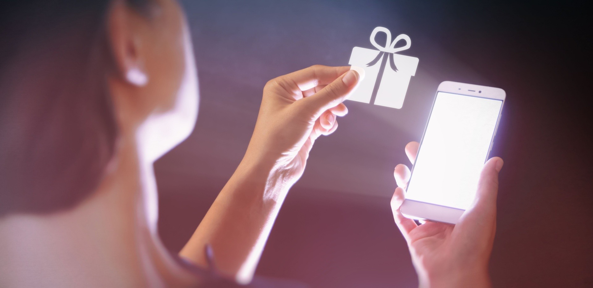 Woman holding a digital gift. 