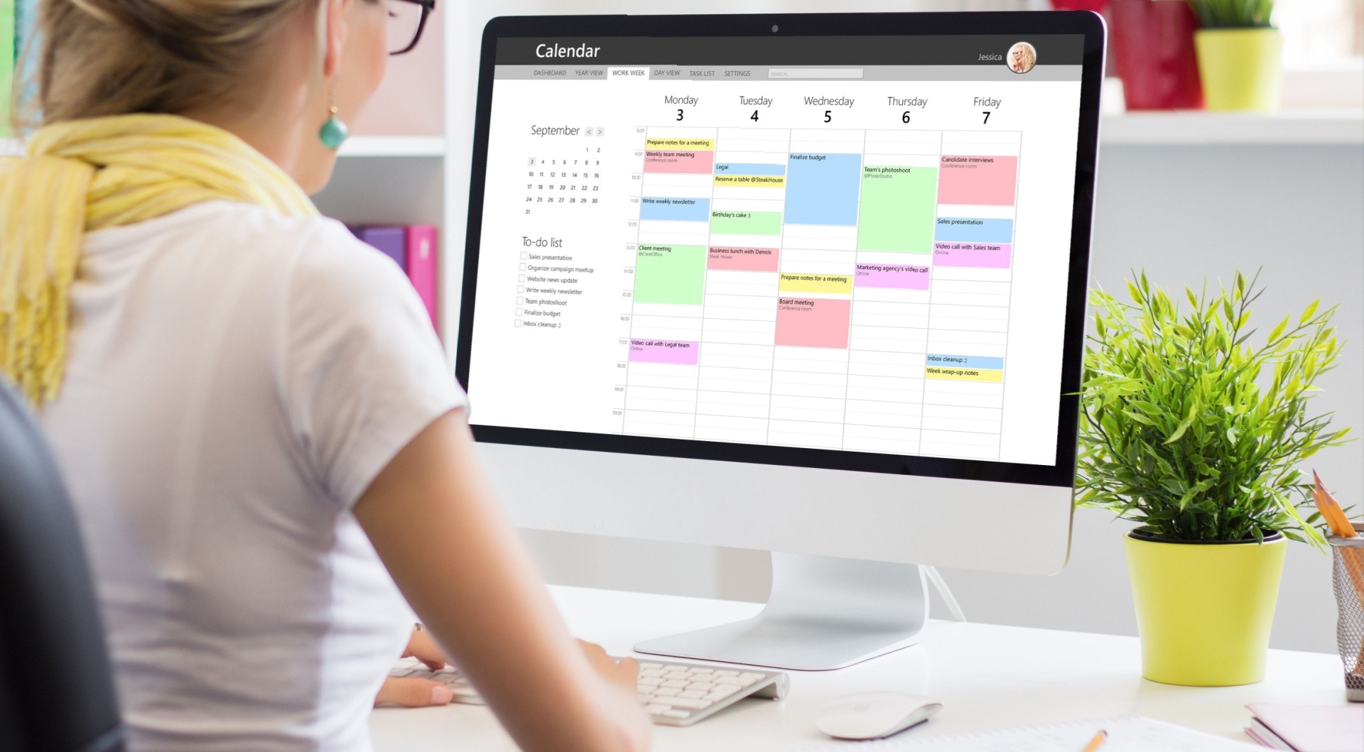 Woman creating a digital planner to sell online