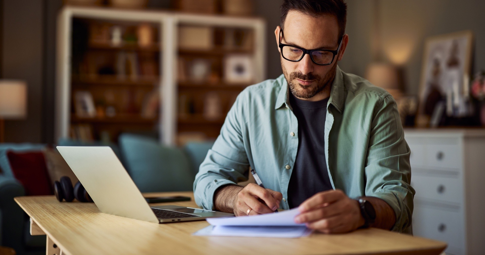 Man doing freelance writing to sell online. 