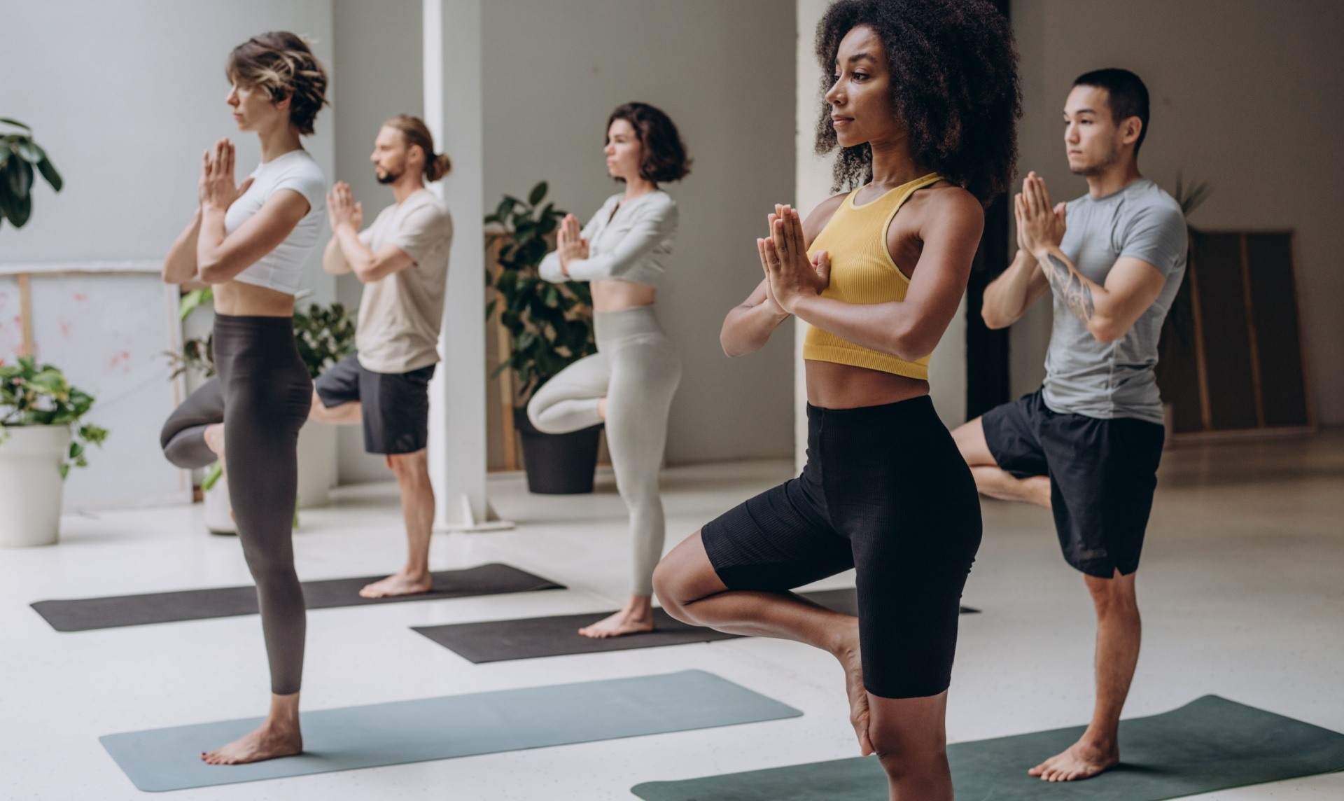 Group of people doing a yoga class