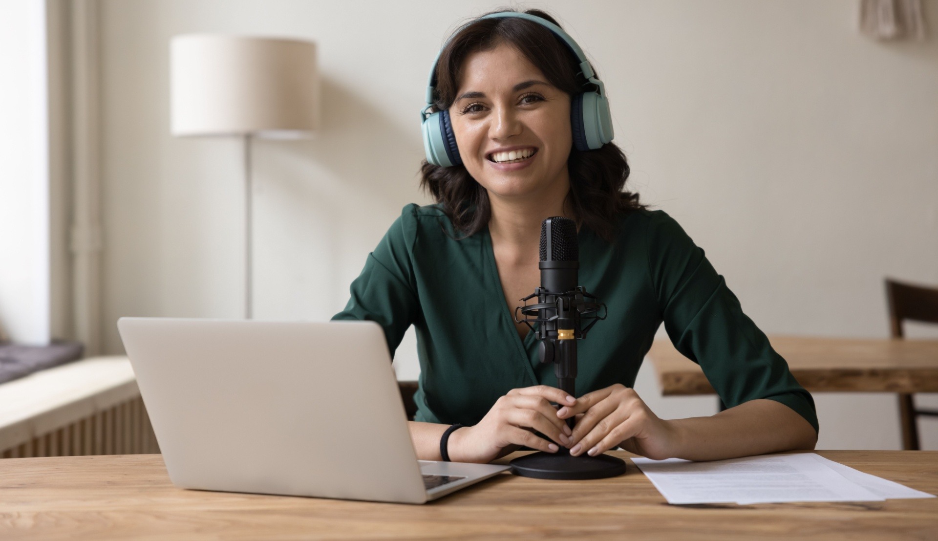 Woman hosting a webinar with a headset on