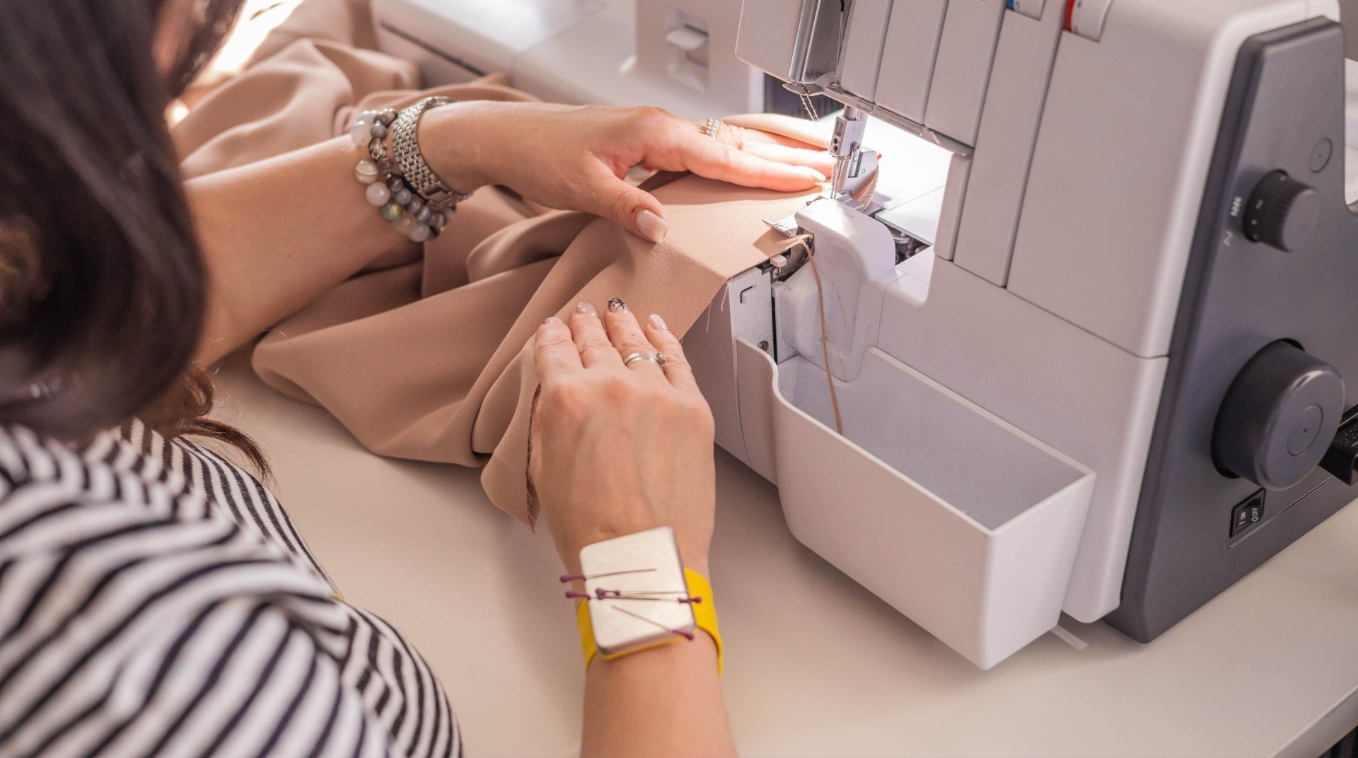 Woman sewing her own digital pattern 