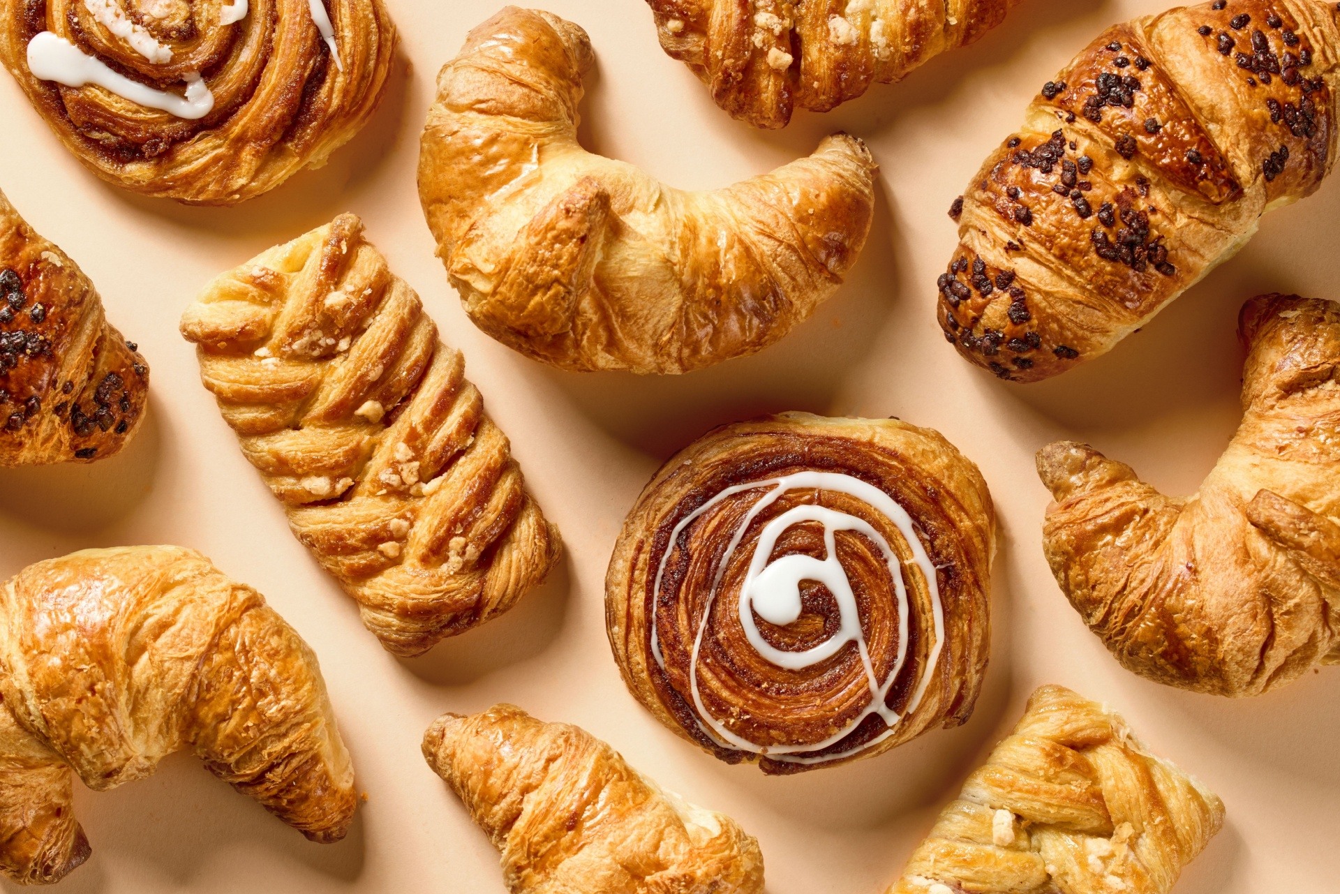 A group of delicious pastries golden brown. 