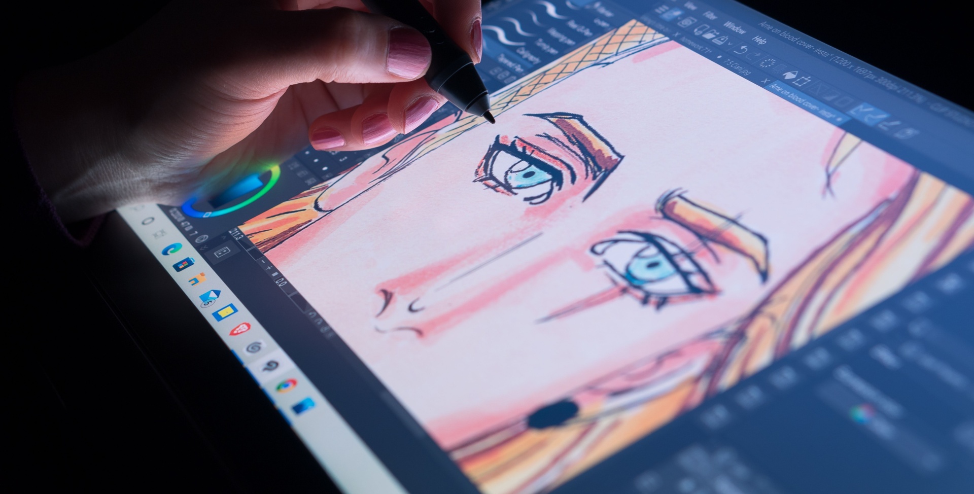 Woman drawing in an anime style with tablet and e pen