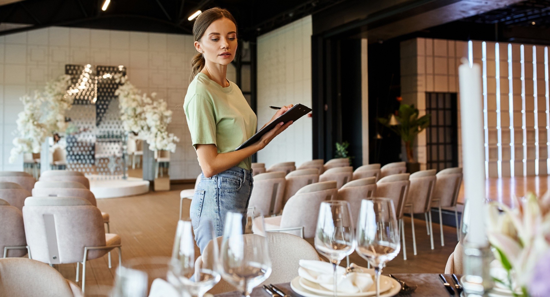 woman looking over an event making sure everything is alright and going smoothly 