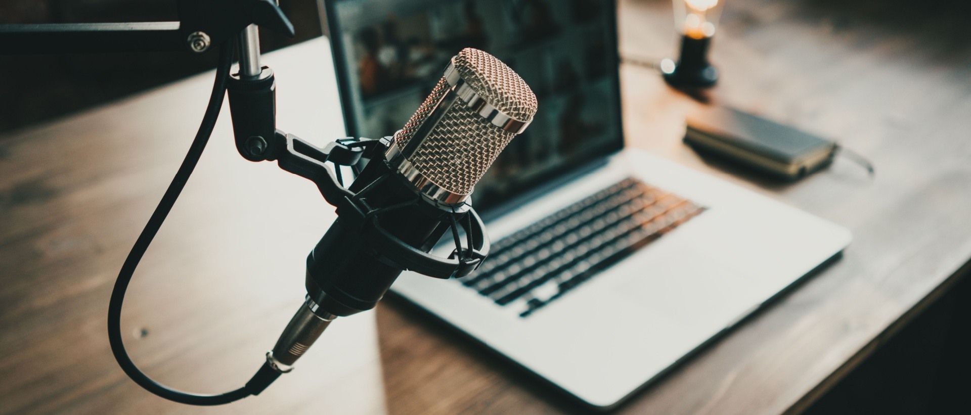 Podcast setup with a mic and a laptop 