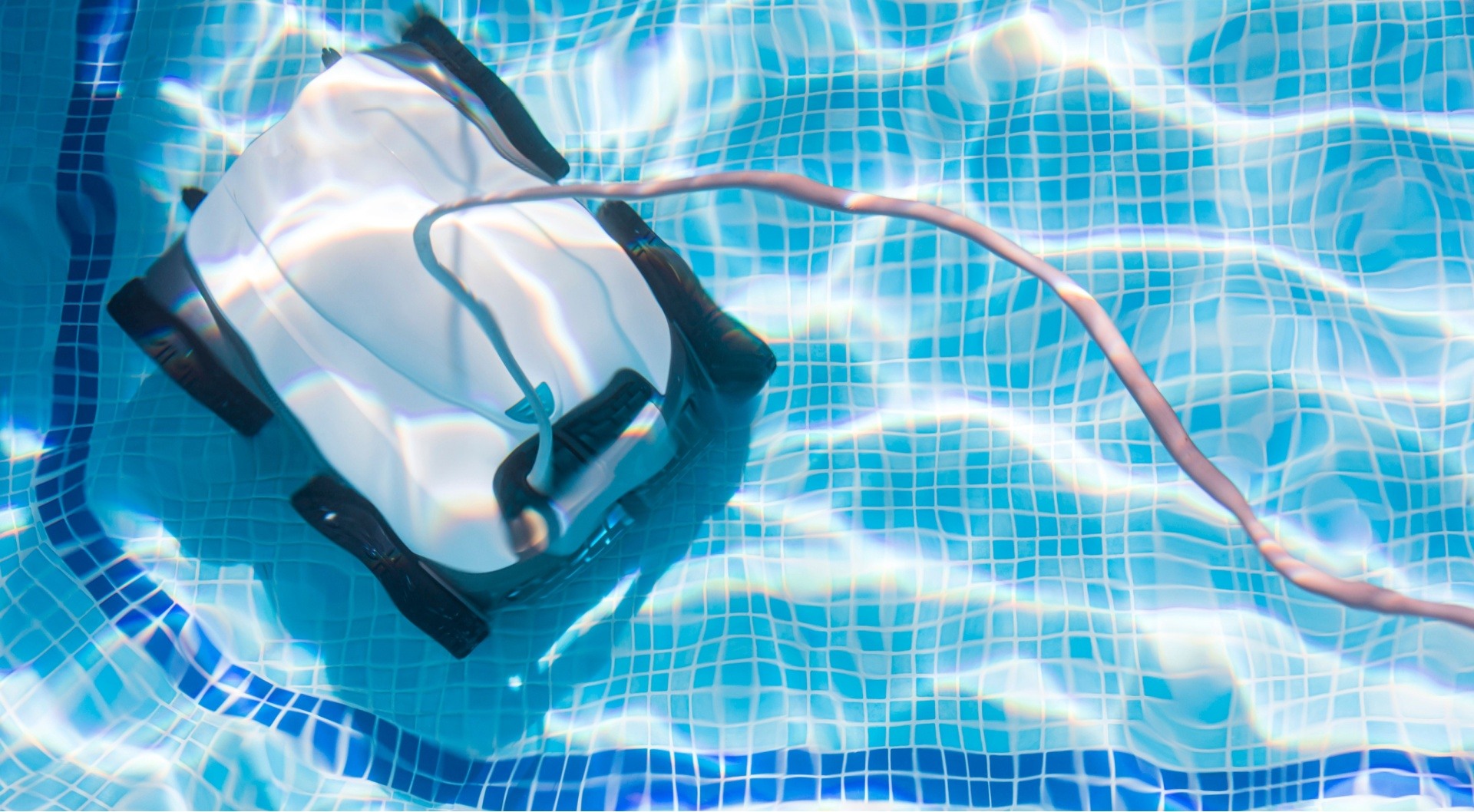 Robotic pool cleaner at the bottom of a pool 